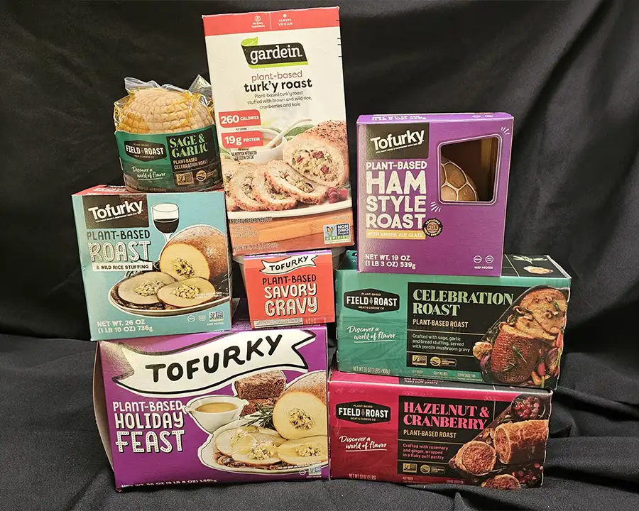 Tofurky, Gardein, and Field Roast vegan holiday roasts and gravy stacked together at Food Fantasies near Jacksonville, IL