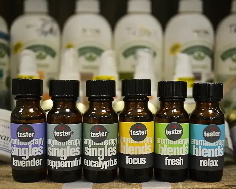 Row of aromatherapy essential oil testers including lavender, peppermint, and eucalyptus at Food Fantasies near Chatham, IL