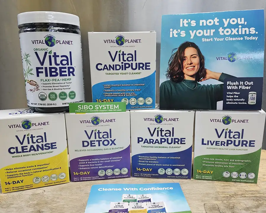 Boxes of Vital Planet herbal cleanse, detox, and fiber supplements stacked on a counter at Food Fantasies near Jacksonville, IL